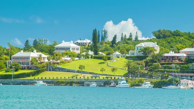 A View Across Hamilton Harbour in Bermuda, seen from the City of Hamilton on a Sunny Day Featuring a Blue Sky, Lush Greenery and Tropical Water on a Day Full of Sunshine