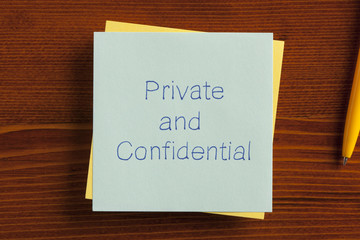Private and Confidential written on a note