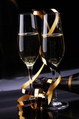 Conceptual Golden Brown Wine on Elegant Glass with Spiral Thin Wrapping Foils or Laces Decoration, on Abstract Brown Background