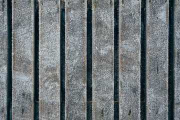 Fototapeta premium Wooden boardwalk covered with hoarfrost