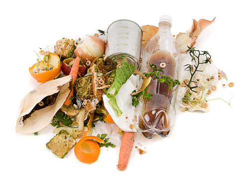 Assortment of kitchen waste and vegetable scraps isolated on white background. 