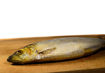 Salted herring on a board