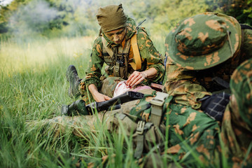 a military doctor to help the wounded soldier