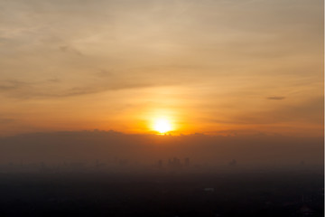 Sunrise over downtown Bangkok, Thailand.  Silhouette cityscape.