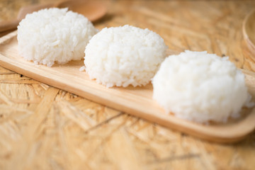 Fototapeta na wymiar Delicious and healthy steamed white Thai rice.