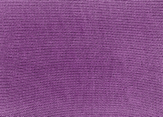 Purple knitted material texture.