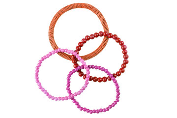 Set of three elastic bracelets made of pearl-like round beads (pink, purple and red) and one orange metallic elastic bracelet, isolated on white background, clipping path included
