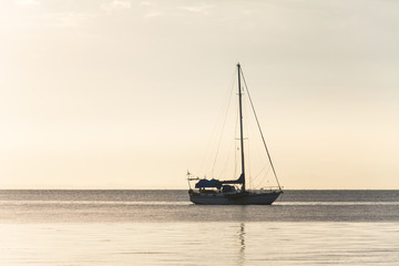 Lonely boat in a calm sea for background