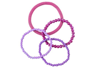 Set of three purple elastic bracelets made of pearl-like round beads and one purple metallic elastic bracelet, isolated on white background, clipping path included