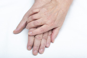 Fototapeta premium Elderly couple holding hands.