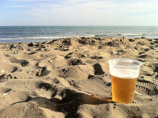 birretta in riva al mare