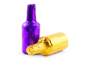 bottles in foil on a white background