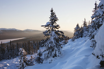 Fototapeta na wymiar mountain range Zyuratkul, winter sunset landscape