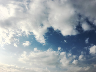Naklejka na ściany i meble White clouds and blue sky background