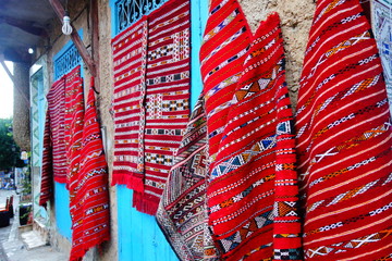 moroccan carpets on the wall