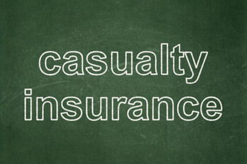 Obraz premium Insurance concept: Casualty Insurance on chalkboard background