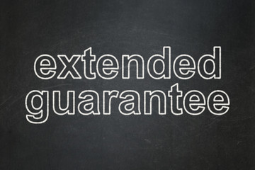 Insurance concept: Extended Guarantee on chalkboard background