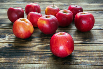 red apples on a wooden background