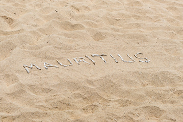 Mauritius inscription in the sand