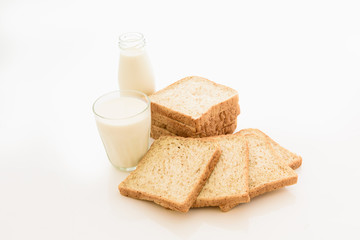 Fototapeta na wymiar glass of milk and whole wheat bread
