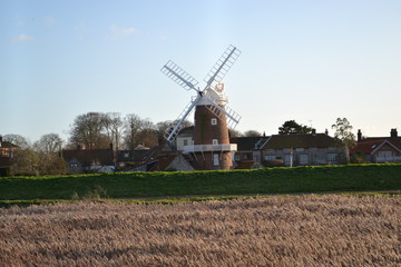 windmill village wheat field 