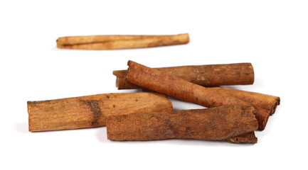 cinnamon sticks isolated on white background