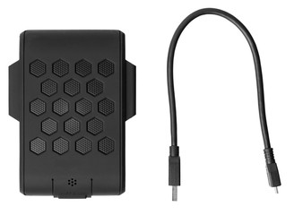 External hard drive in the protected rubber casing and a wire for it. Top view
