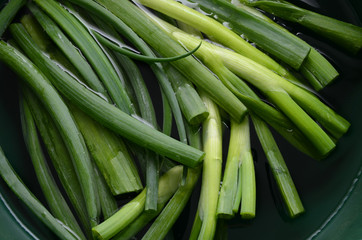 Closeup of Onions - Washing onions with water before cutting