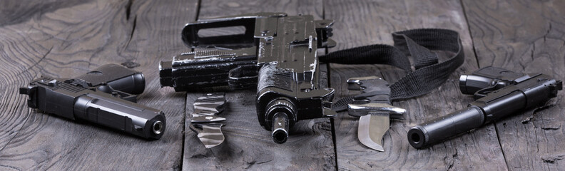 gun and two pistols, firearms, terrorism