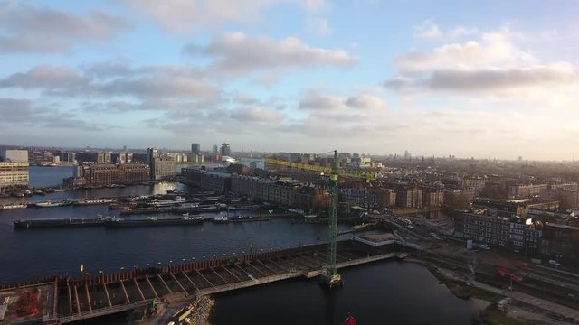 Amsterdam skyline from river IJ, aerial.