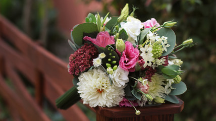 wedding bouquet on a wooden floor
