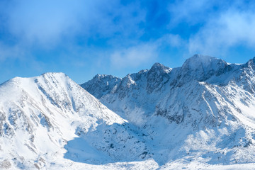 Fototapeta na wymiar Sky and mountains in winter