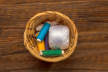 Fototapeta na wymiar Colorful bobbins of threads