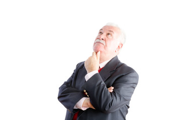 Thoughtful white haired senior businessman