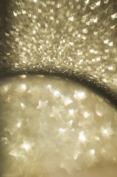 Gold glitter with stars zoom effect