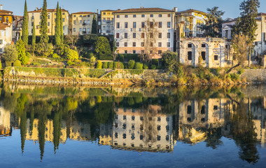 Obraz premium Reflection in the river Brenta in Bassano del Grappa 