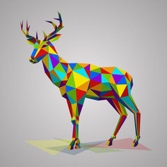 Colorful deer with horns. Vector illustration in polygonal style. Variegated forest animal on white background.