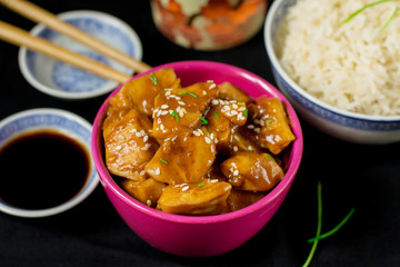 Chinese style sweet and sour chicken with sesame seeds