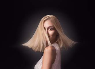 young girl fashion model face head blond hair moving