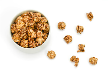 Homemade chocolate Popcorn in a Bowl and white background.