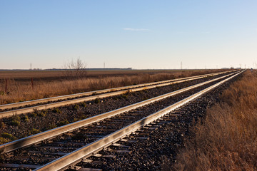 Two Pairs of Tracks Stretching Off to the Horizon