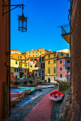 Tellaro village street and boats. Cinque terre, Ligury Italy - obrazy, fototapety, plakaty