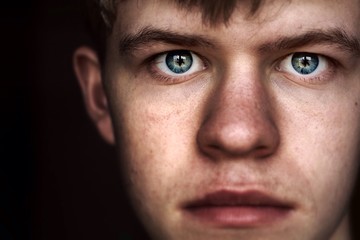 Close-Up of White Male Staring into Camera - 131845082