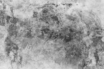 Dark grunge textured cement wall closeup