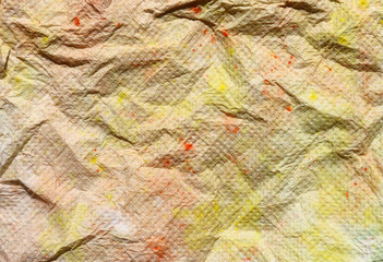 Textural of crumpled tissue paper rendering in multicolored for abstract background.