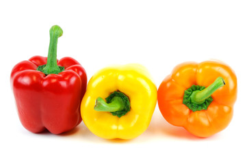 colorful bell peppers isolated on white background