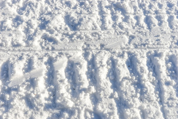 Snowmobile track marks on the snow, snow background
