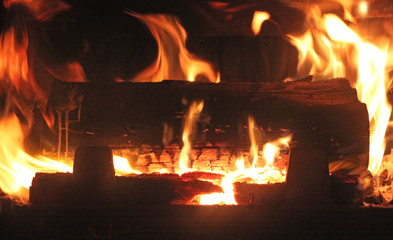 Woods burning in hot fire chimney