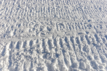 Snowmobile track marks on the snow, snow background