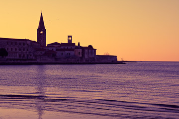 Fototapeta premium Panorama of Porec, Croatia, dual toning ,purple, yellow